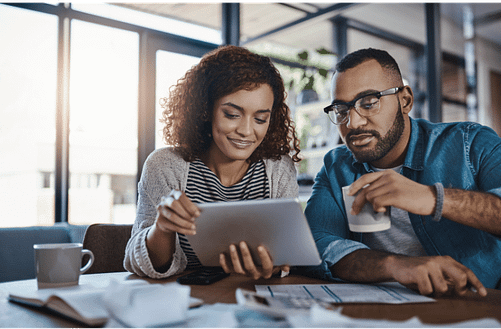 A person looking at their credit score and understanding how to overcome common credit challenges