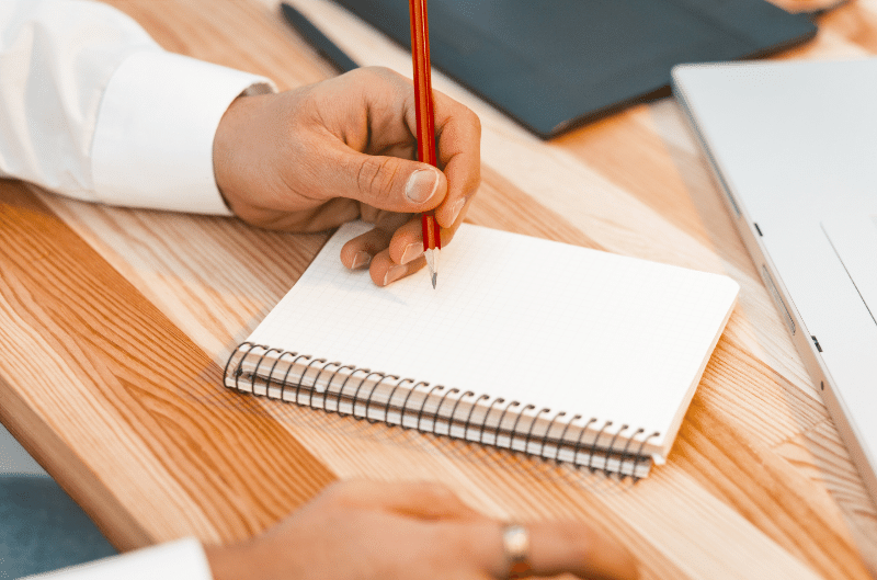 A person writing a 609 letter