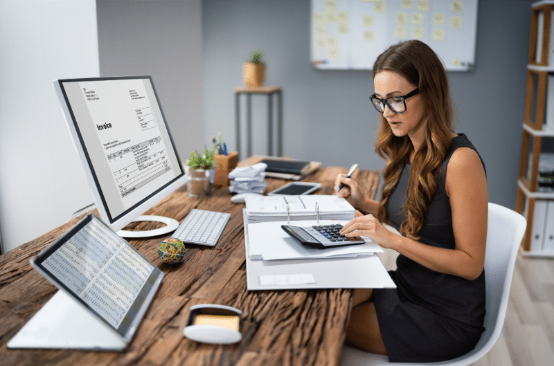 An image showing a calculator with the words debt-to-income ratio on the screen, representing the importance of understanding what is a good debt to income ratio for improving your financial health.