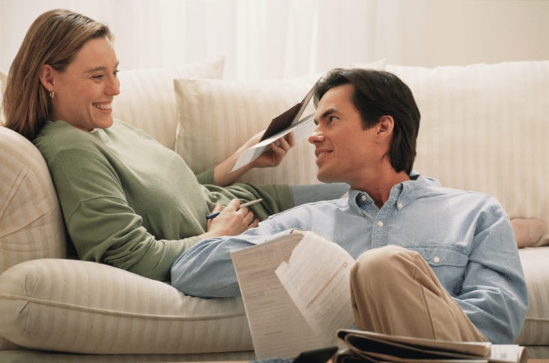 A person making multiple payments on their credit card bill