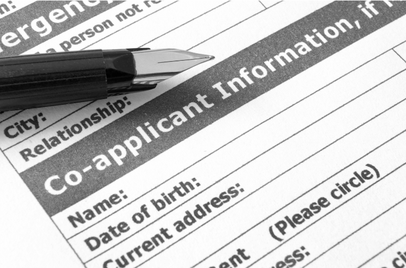 A guarantor or co-signer helping a tenant to rent after an eviction